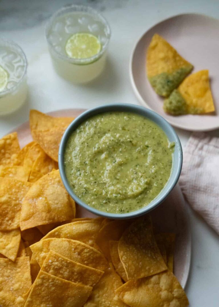 Salsa Verde in a bowl with chips.
