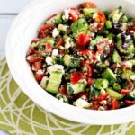 Tomato Cucumber Salad with Mint and Feta in serving bowl