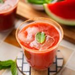 Watermelon jaljeera served in a glass.