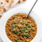 Blended Arabic lentil soup in a large white bowl.