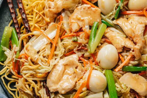 Chicken pan fried noodles close up
