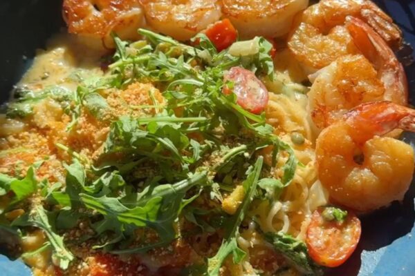 Creamy Garlic Shrimp Pasta with Arugula and Tomatoes at Napa