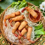 Shrimp in a blanket, served with a sweet chili dipping sauce.