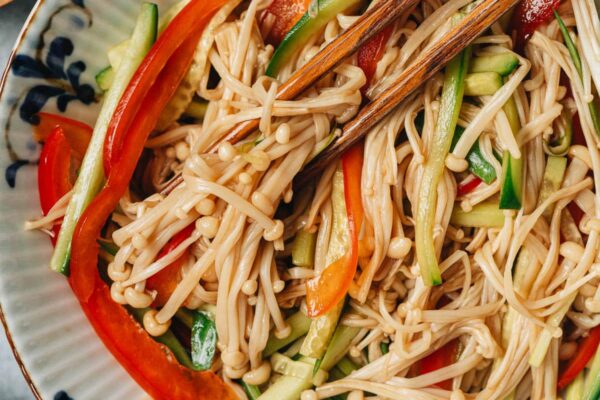 Chinese enoki mushroom salad close up