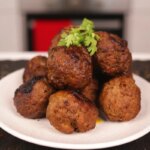 Indian Spiced Ground Beef Meatballs (Dohshaiñ) on a plate.