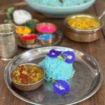 Neelkantha Pulao, a rice offering for the divine with blue butterfly pea flowers.