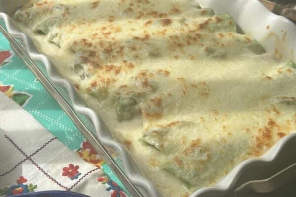 pan of sour cream enchiladas