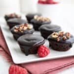 Keto Texas Sheet Cake Bites arranged on a white rectangular tray.