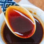 stir fry sauce in a spoon close up