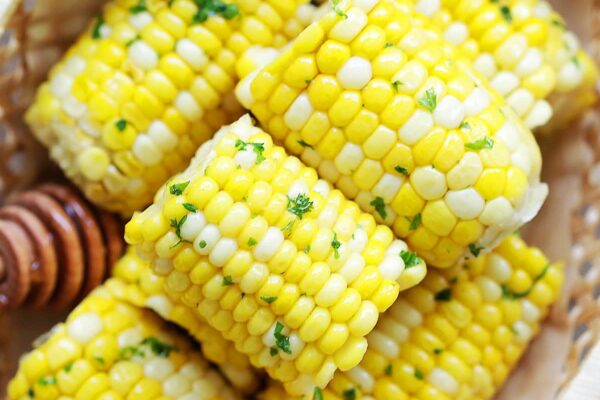 Honey Butter Corn – Rasa Malaysia Easy honey butter corn on the cob arranged in a wooden basket.