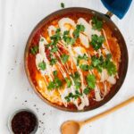 Shakshuka with harissa & tahini drizzle