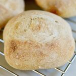 sourdough roll on cooling rack