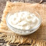 A bowl of homemade heavy cream used as a heavy cream substitute.